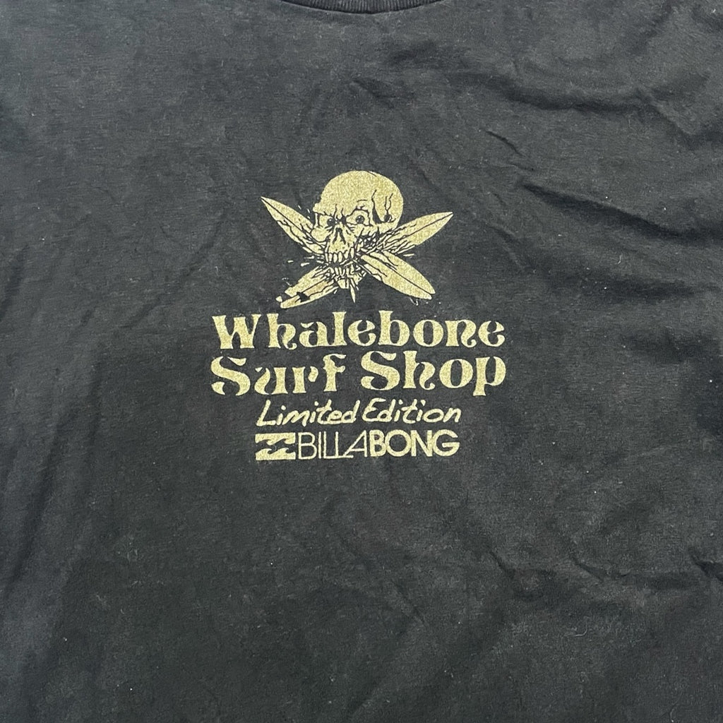 Black t-shirt with yellow 'Whalebone Surf Shop' and 'Billabong' logo