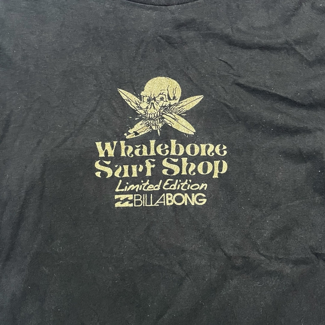 Black t-shirt with yellow 'Whalebone Surf Shop' and 'Billabong' logo
